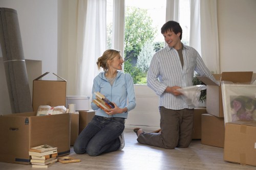 Moving team handling household items during a booking