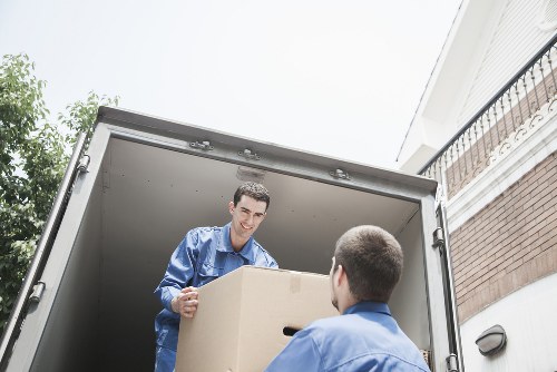 Movers loading furniture into a removal van in Wapping
