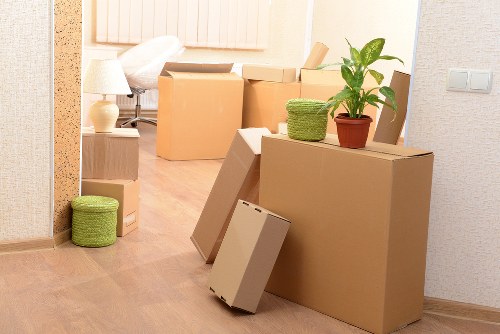 Efficient man with a van preparing boxes for transport